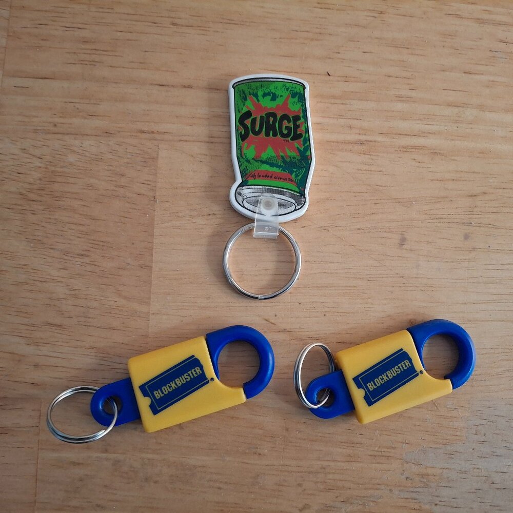 2x Vintage Blockbuster Video Keychains + Vintage Surge Keychain